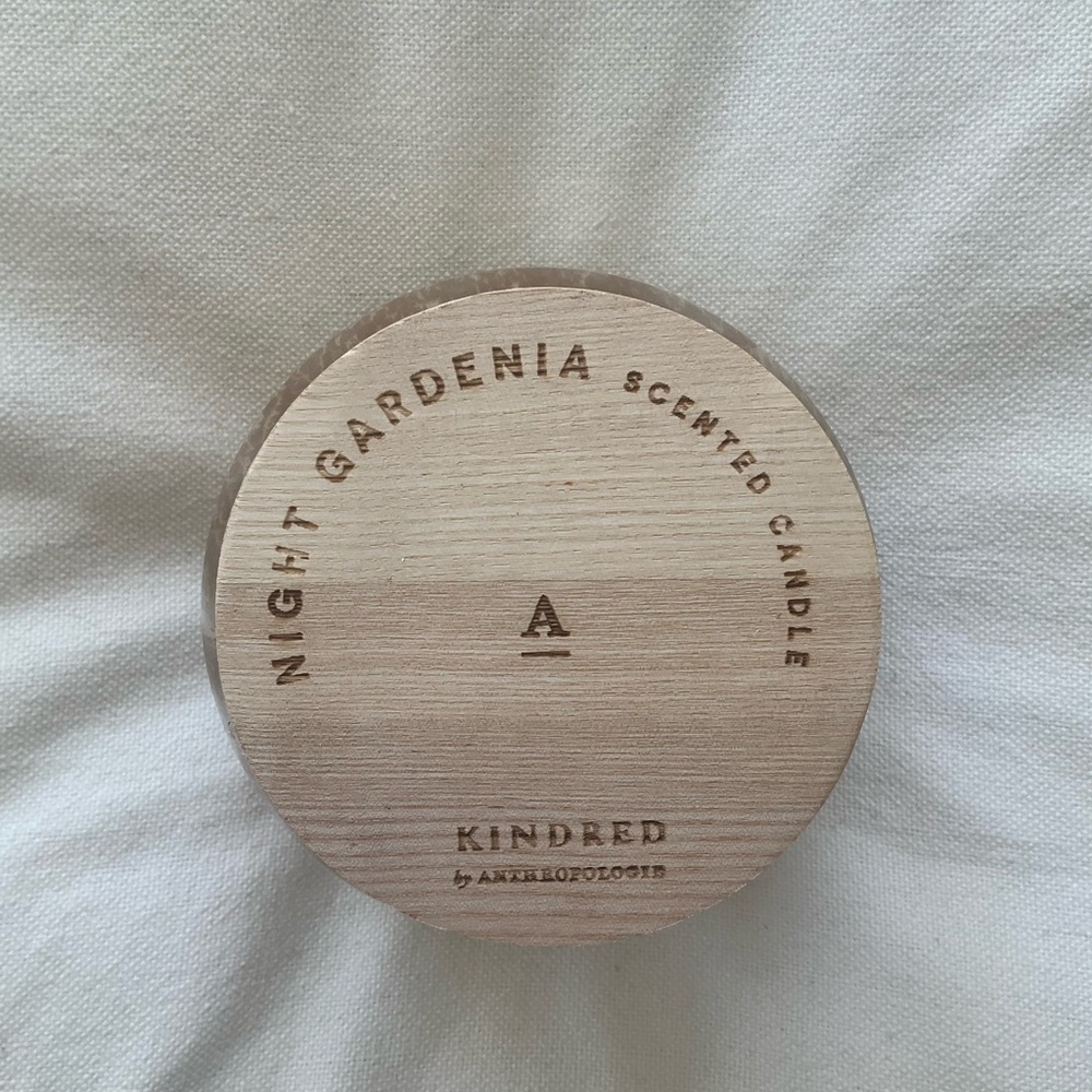 Anthropologie Kindred Night Gardenia Scented Candle. 
Wooden Top.